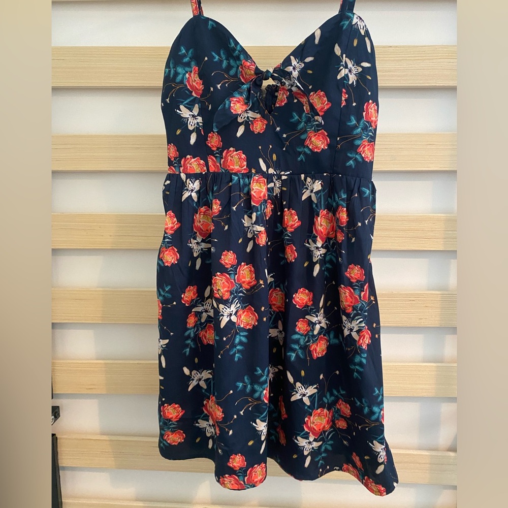Roxy Floral Mini Dress with Spaghetti Straps and Bow detail